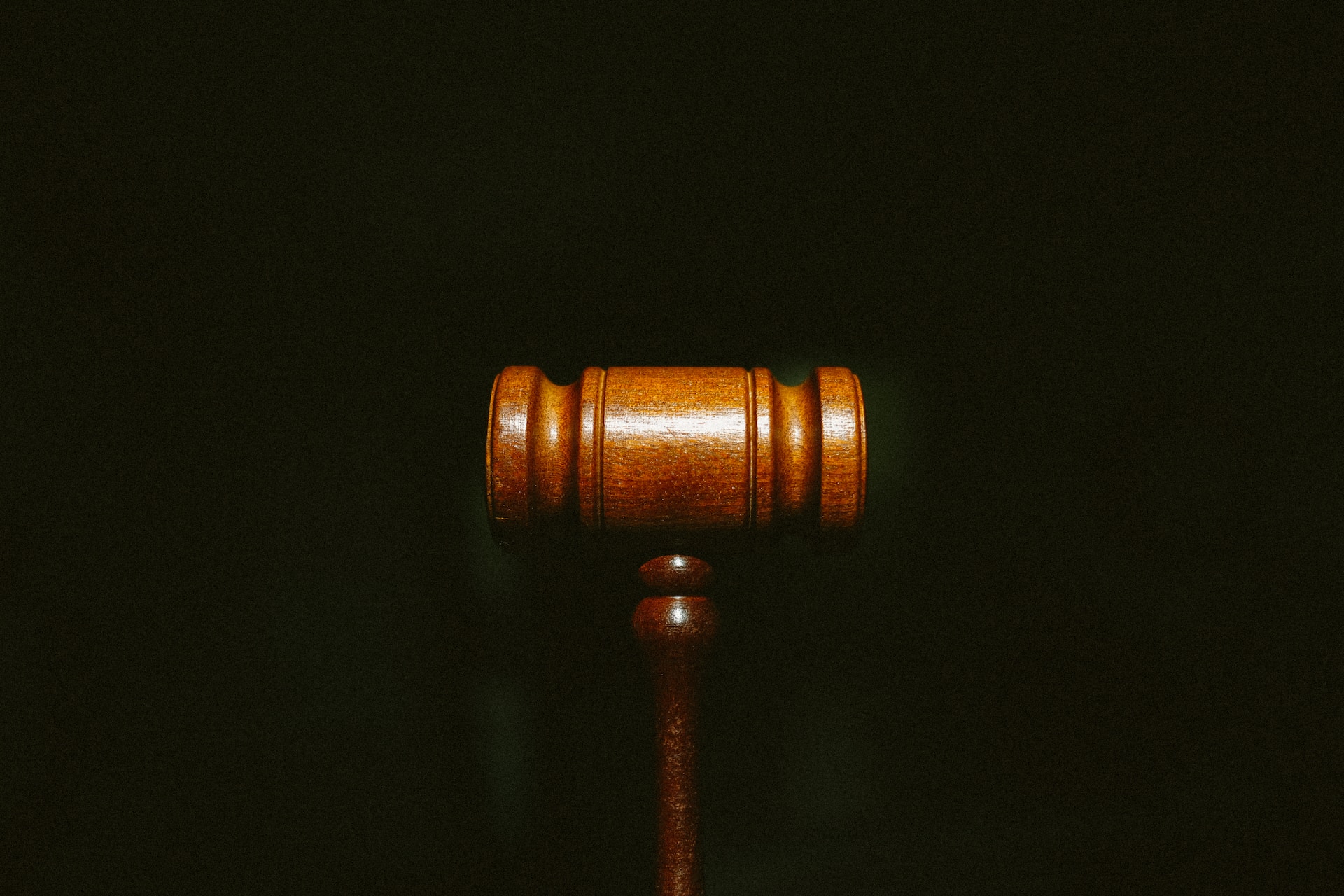A photograph of a judge's gavel.